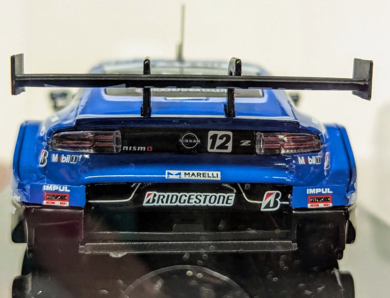 Carica immagine in Galleria Viewer, Ebbro 1/43 Calsonic Impul Z #12 2022 Super GT Champion - Used