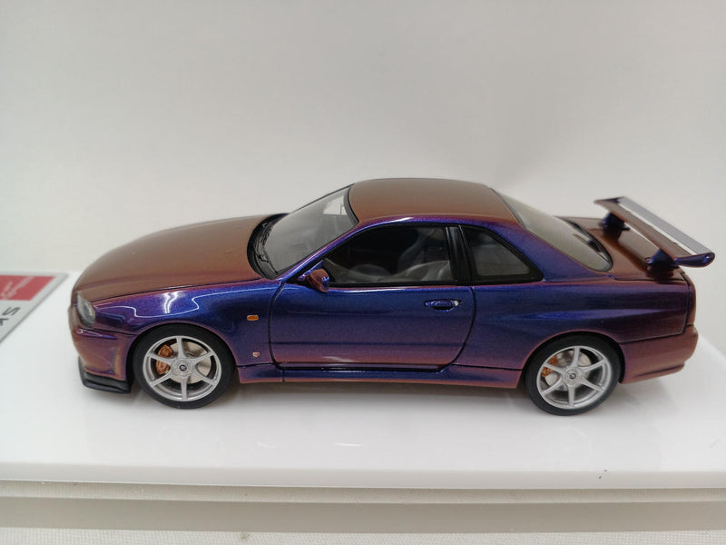 Laden Sie das Bild in Galerie -Viewer, MAKE UP EIDOLON Nissan Skyline GT-R (BNR34) V-spec II 2000 Midnight Purple 1/43– Used