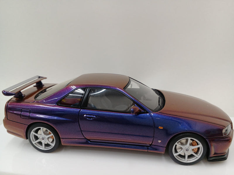 Laden Sie das Bild in Galerie -Viewer, MAKE UP EIDOLON Nissan Skyline GT-R (BNR34) V-spec II 2000 Midnight Purple 1/43– Used