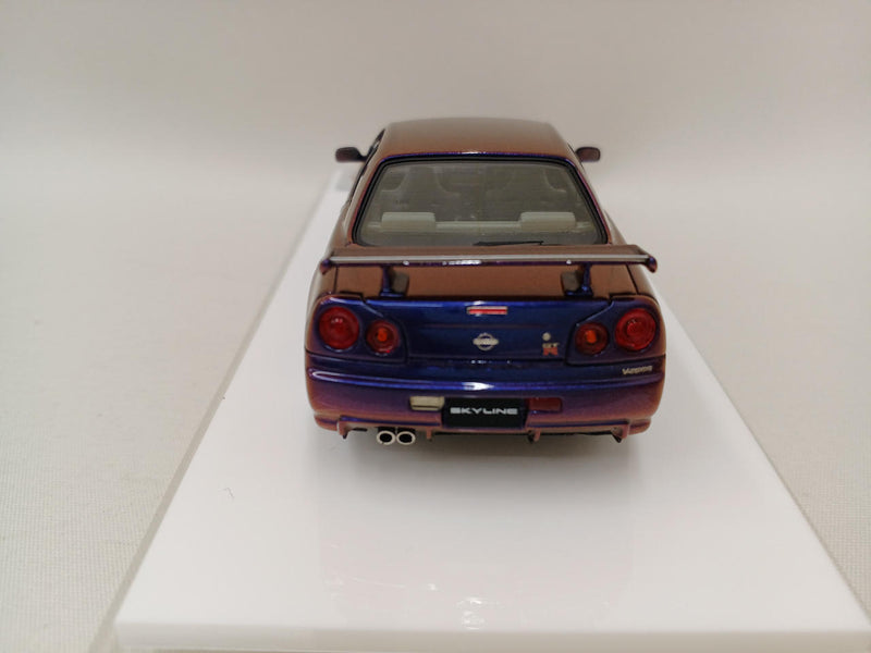 Laden Sie das Bild in Galerie -Viewer, MAKE UP EIDOLON Nissan Skyline GT-R (BNR34) V-spec II 2000 Midnight Purple 1/43– Used