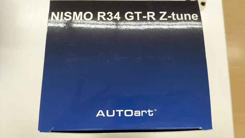 Load image into Gallery viewer, AUTOart Nismo R34 GT-R Z-TUNE Bayside Blue 1/18 Diecast Car– Used