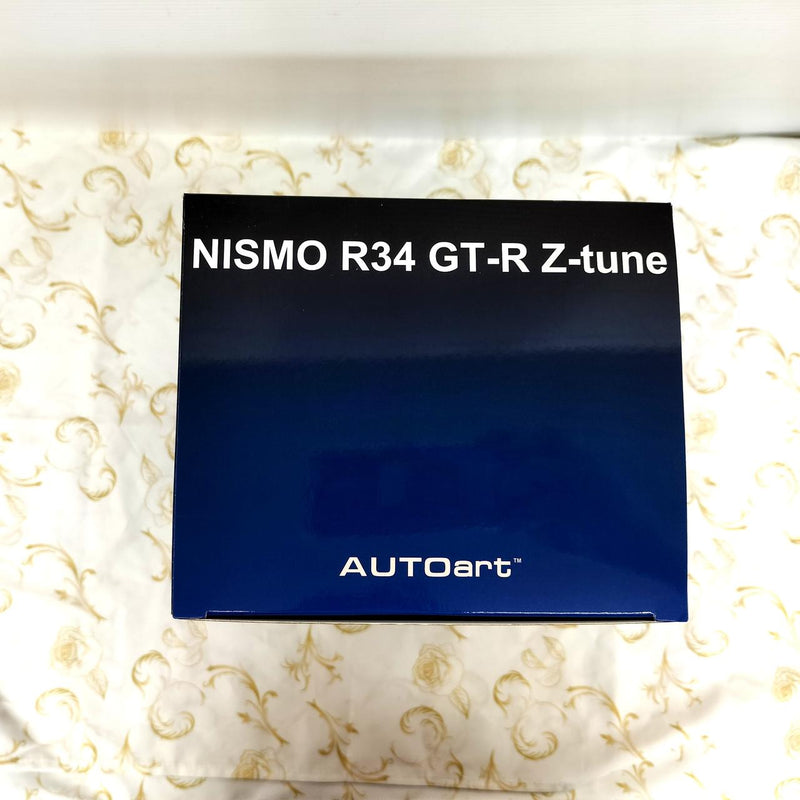 Load image into Gallery viewer, AUTOart NISMO R34 GT-R Z-TUNE Silver 1/18 Diecast Car– Used