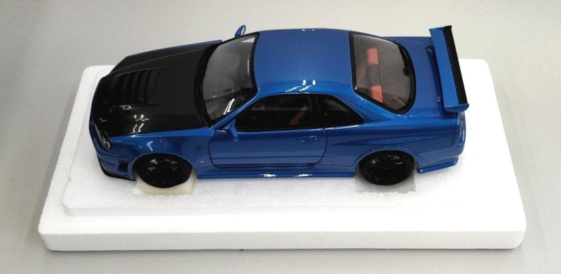 Laden Sie das Bild in Galerie -Viewer, AUTOart 1/18 Nismo R34 GT-R Z-tune (Bayside Blue/Carbon Black Hood)– Used