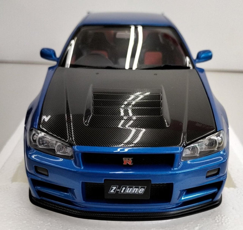Laden Sie das Bild in Galerie -Viewer, AUTOart 1/18 Nismo R34 GT-R Z-tune (Bayside Blue/Carbon Black Hood)– Used