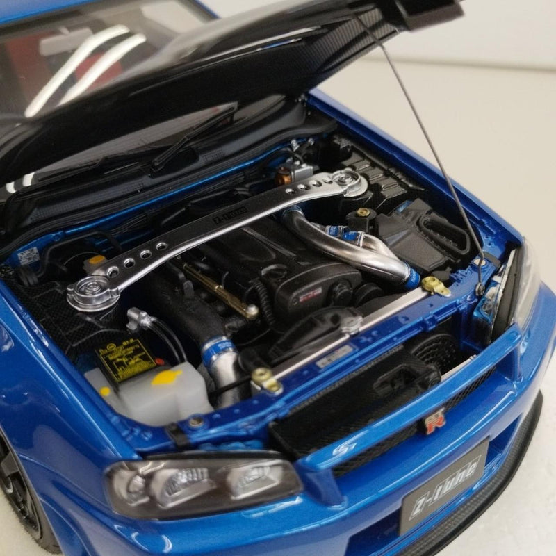 Laden Sie das Bild in Galerie -Viewer, AUTOart 1/18 Nismo R34 GT-R Z-tune (Bayside Blue/Carbon Black Hood)– Used