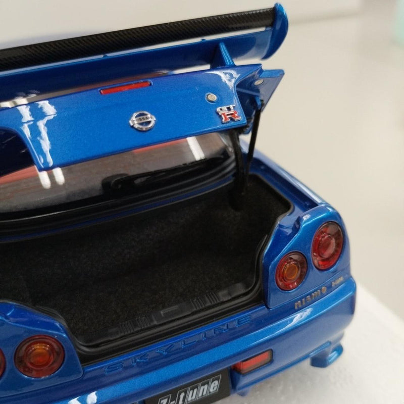 Laden Sie das Bild in Galerie -Viewer, AUTOart 1/18 Nismo R34 GT-R Z-tune (Bayside Blue/Carbon Black Hood)– Used