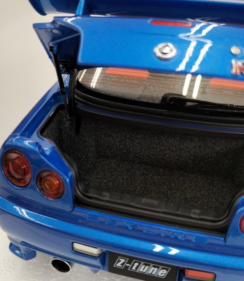Laden Sie das Bild in Galerie -Viewer, AUTOart 1/18 Nismo R34 GT-R Z-tune (Bayside Blue/Carbon Black Hood)– Used