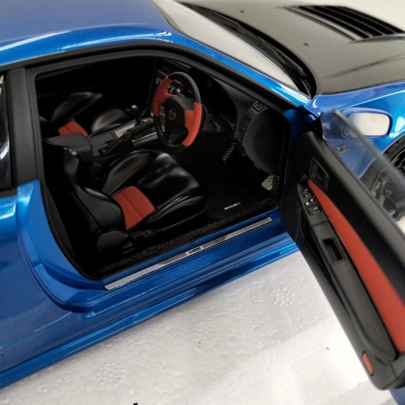 Laden Sie das Bild in Galerie -Viewer, AUTOart 1/18 Nismo R34 GT-R Z-tune (Bayside Blue/Carbon Black Hood)– Used