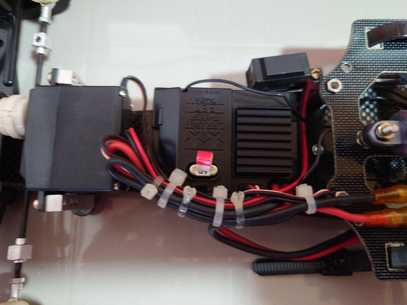 Load image into Gallery viewer, Used Ferrari F187 RC Car with Kyosho Pit Box and Spare Tires