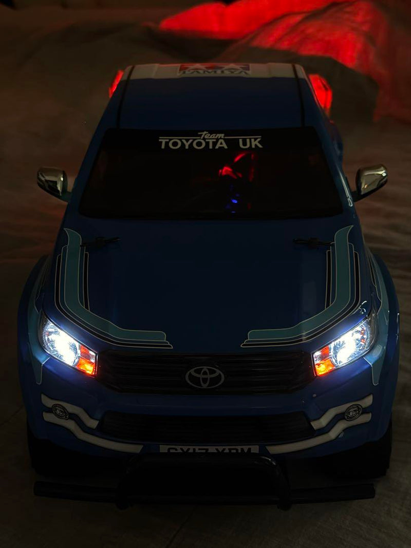 Load image into Gallery viewer, Used Tamiya 1/10 Hilux Extra Cab Assembled Full LED Custom with 3CH Radio