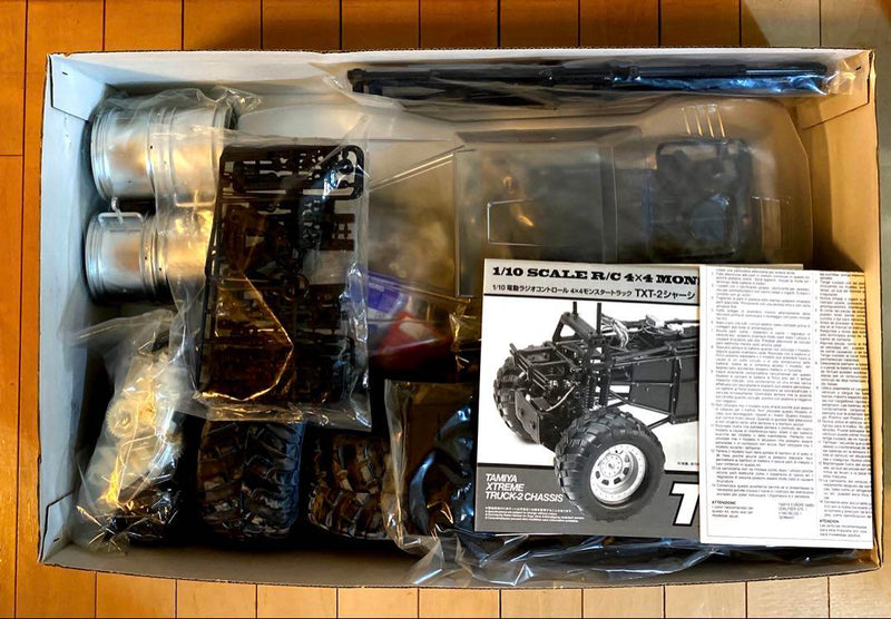 Load image into Gallery viewer, Used Tamiya 1/10 Agrios TXT-2 4x4 Monster Truck Kit Unopened with Bonus Motor