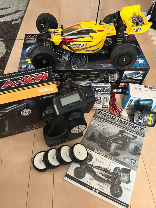 Used Tamiya DF-03 Dark Impact with Optional Parts & Futaba MX-V Radio