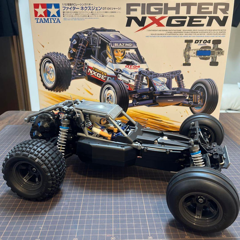 Laden Sie das Bild in Galerie -Viewer, Tamiya Fighter Nexgen DT-04 with Option Parts & Kyosho 2.4GHz Radio Set Unused - Used