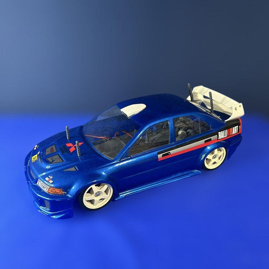 Used Tamiya 1/10 Lancer Evolution V WRC Assembled RC with Sanwa Radio