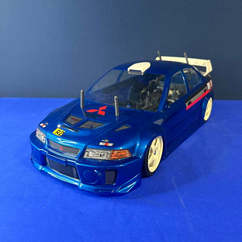 Load image into Gallery viewer, Used Tamiya 1/10 Lancer Evolution V WRC Assembled RC with Sanwa Radio