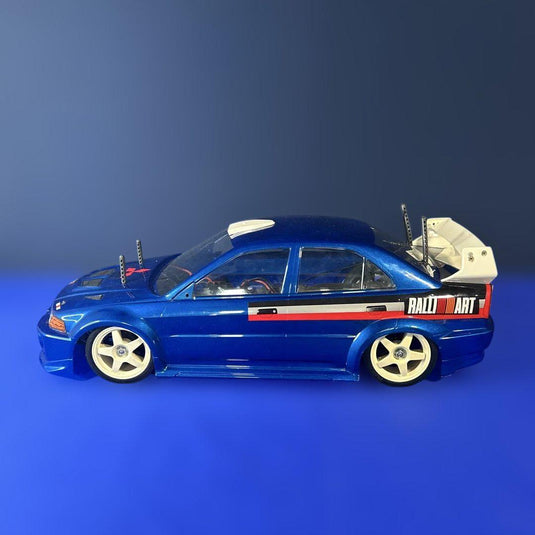 Used Tamiya 1/10 Lancer Evolution V WRC Assembled RC with Sanwa Radio
