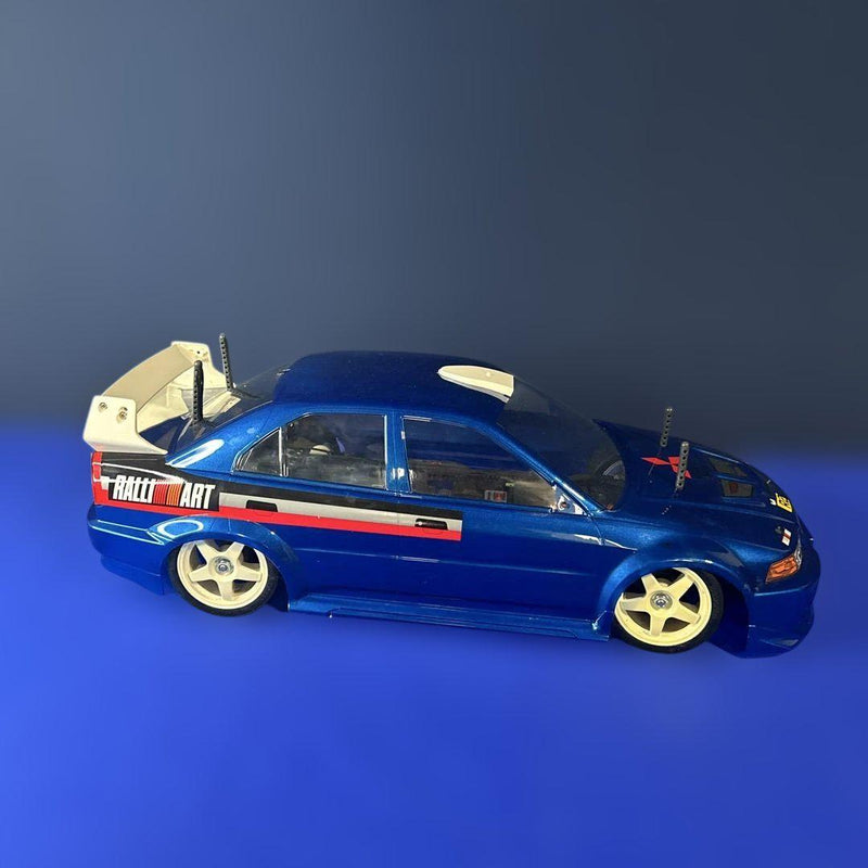 Load image into Gallery viewer, Used Tamiya 1/10 Lancer Evolution V WRC Assembled RC with Sanwa Radio