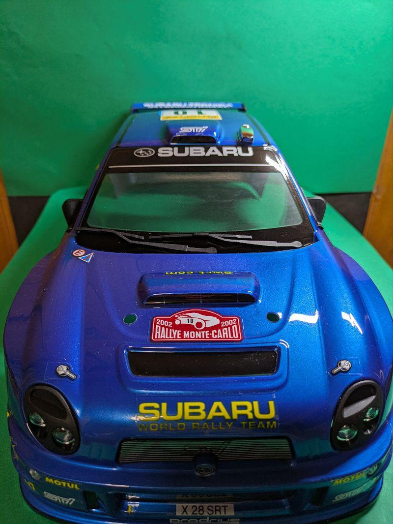 Laden Sie das Bild in Galerie -Viewer, Kyosho FAZER MK2 FZ02-R Subaru Impreza WRC 2002 ReadySet Unused Displayed Only - Used