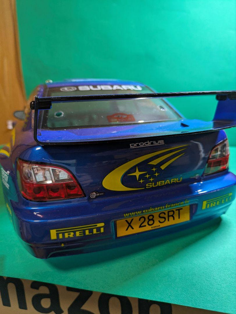 Laden Sie das Bild in Galerie -Viewer, Kyosho FAZER MK2 FZ02-R Subaru Impreza WRC 2002 ReadySet Unused Displayed Only - Used