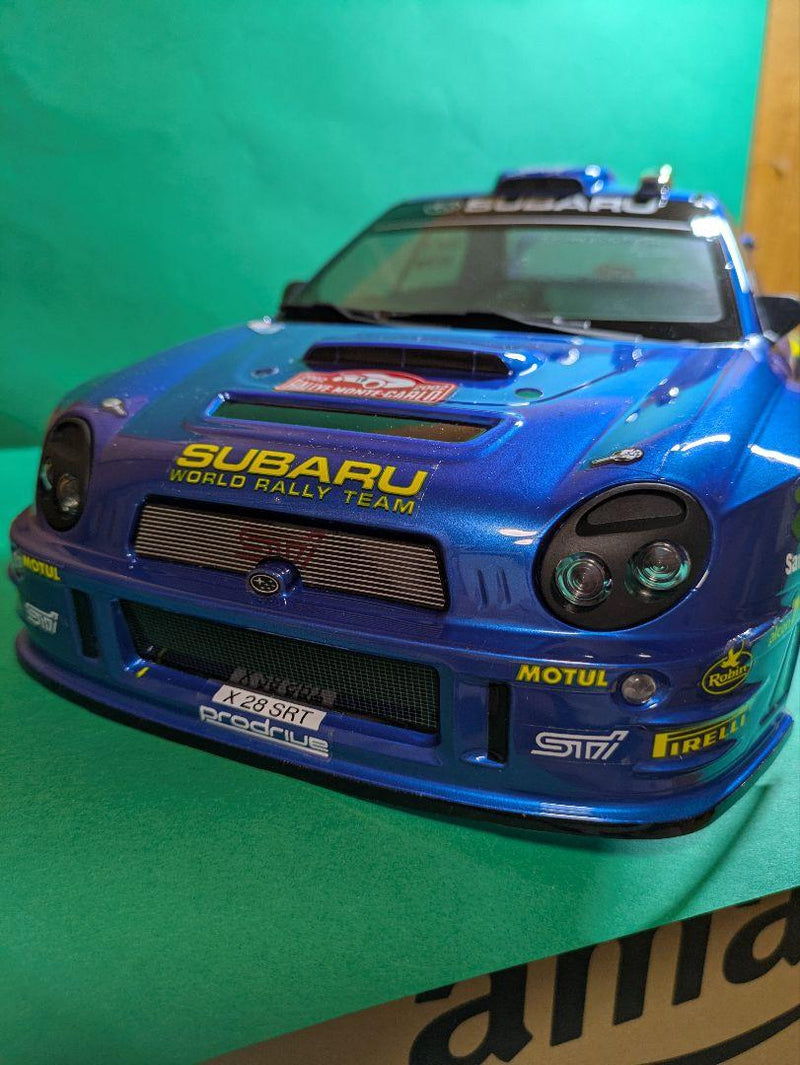 Laden Sie das Bild in Galerie -Viewer, Kyosho FAZER MK2 FZ02-R Subaru Impreza WRC 2002 ReadySet Unused Displayed Only - Used