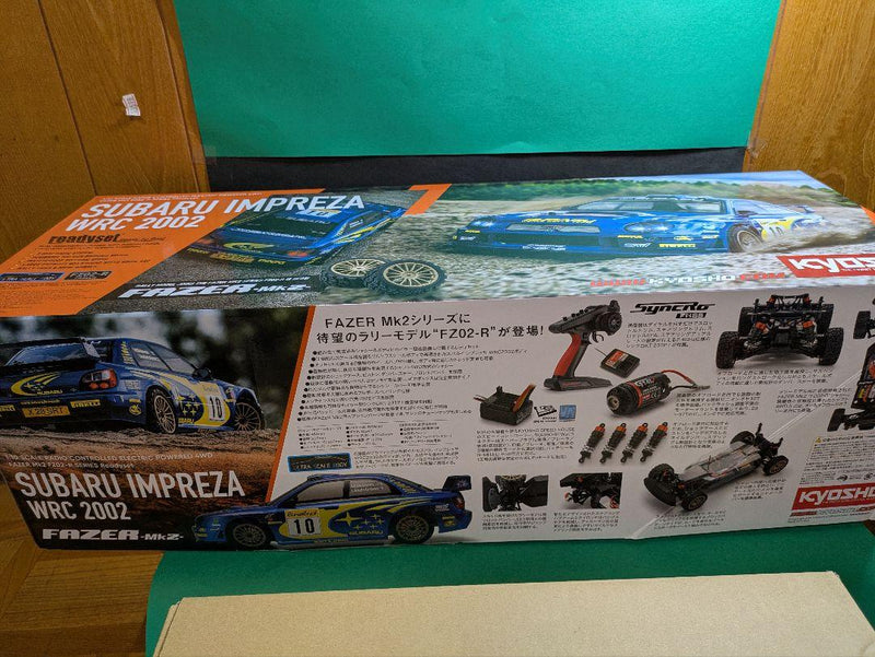 Laden Sie das Bild in Galerie -Viewer, Kyosho FAZER MK2 FZ02-R Subaru Impreza WRC 2002 ReadySet Unused Displayed Only - Used