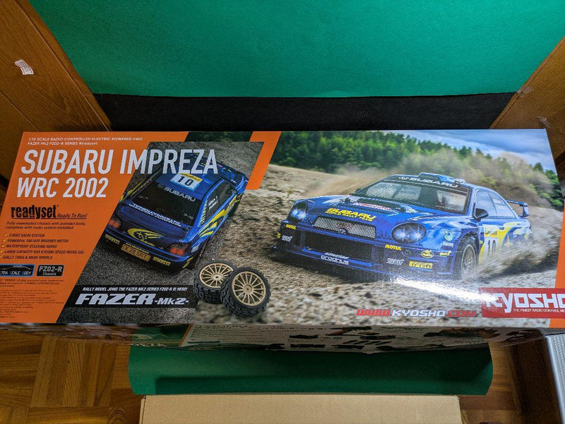 Laden Sie das Bild in Galerie -Viewer, Kyosho FAZER MK2 FZ02-R Subaru Impreza WRC 2002 ReadySet Unused Displayed Only - Used