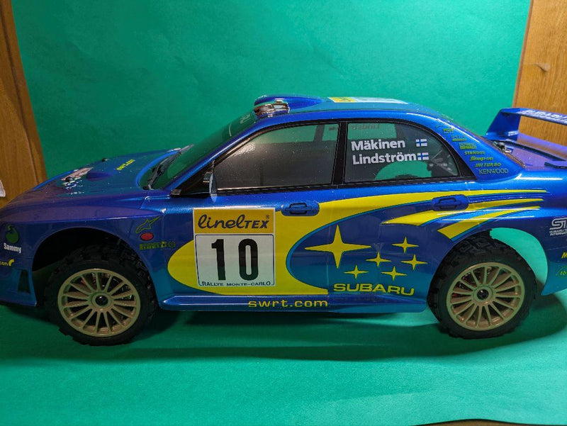 Laden Sie das Bild in Galerie -Viewer, Kyosho FAZER MK2 FZ02-R Subaru Impreza WRC 2002 ReadySet Unused Displayed Only - Used