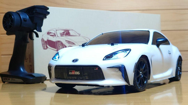 Chargez l'image dans la visionneuse de la galerie, Used Tamiya Toyota GR86 White Assembled Full Set with Sanwa MX-6 Transmitter Unused