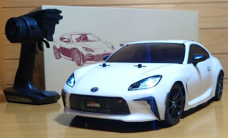 Chargez l'image dans la visionneuse de la galerie, Used Tamiya Toyota GR86 White Assembled Full Set with Sanwa MX-6 Transmitter Unused