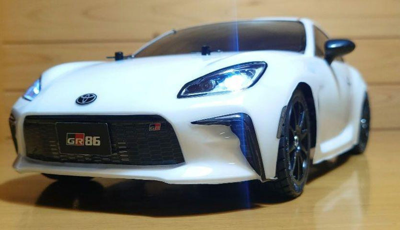 Chargez l'image dans la visionneuse de la galerie, Used Tamiya Toyota GR86 White Assembled Full Set with Sanwa MX-6 Transmitter Unused