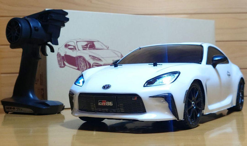 Chargez l'image dans la visionneuse de la galerie, Used Tamiya Toyota GR86 White Assembled Full Set with Sanwa MX-6 Transmitter Unused