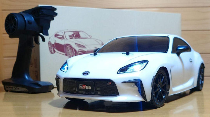 Chargez l'image dans la visionneuse de la galerie, Used Tamiya Toyota GR86 White Assembled Full Set with Sanwa MX-6 Transmitter Unused