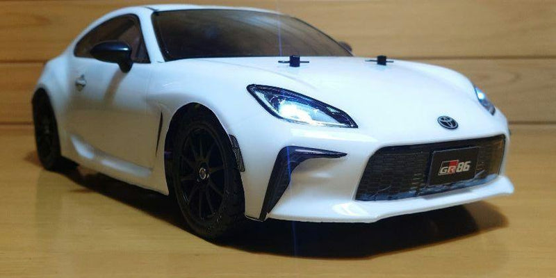 Chargez l'image dans la visionneuse de la galerie, Used Tamiya Toyota GR86 White Assembled Full Set with Sanwa MX-6 Transmitter Unused