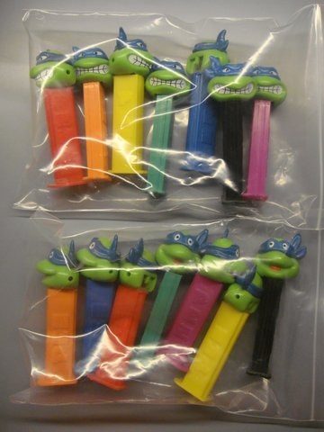 PEZ The Complete Set of 56 Teenage Mutant Ninja Turtles PEZ Dispensers (Thick Feet) - Used