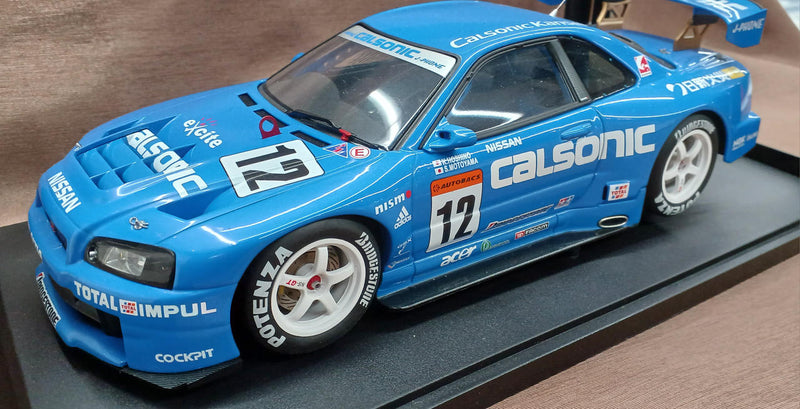 Load image into Gallery viewer, AUTOart GT-R (R34) V-SPEC II White Pearl 1/18 Scale Car– Used
