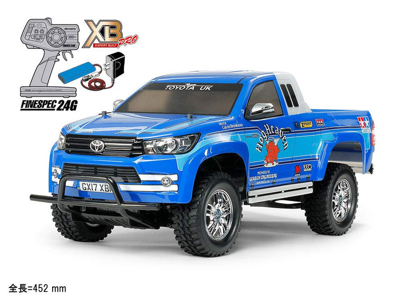 Laden Sie das Bild in Galerie -Viewer, TAMIYA 1/10 XB Series No.221 XB Toyota Hilux Extra Cab (CC-01 Chassis) Complete painted model with radio 57921
