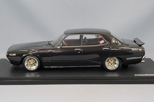 Ignition Model 1/18 Nissan Skyline 2000 GT-X (GC110) Black Metallic w/ Yayoi 14-inch Wheels (Polished/Gold) IG3269