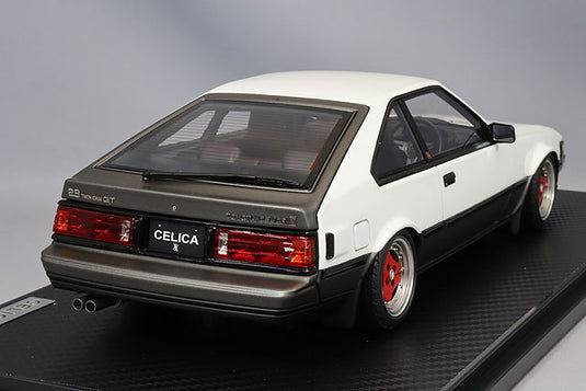 Ignition Model 1/18 Toyota Celica XX 2800GT (A60) White/Gunmetallic w/ ADVAN A3A Type 15-inch Wheels IG3536