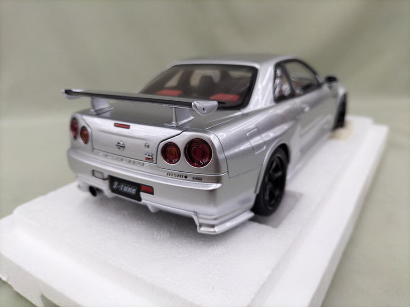 Load image into Gallery viewer, AUTOart Silver NISMO R34 GT-R Z-TUNE 1/18 Scale Car– Used
