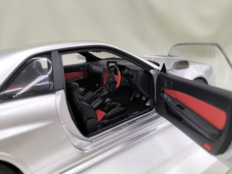 Load image into Gallery viewer, AUTOart Silver NISMO R34 GT-R Z-TUNE 1/18 Scale Car– Used
