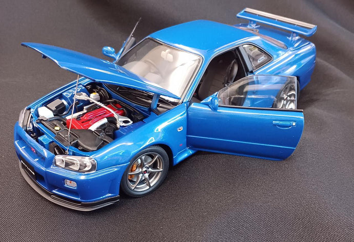AUTOart 77335 SKYLINE GT-R R34 V-SPEC II UPGRADED 1/18 Scale Model Car– Used