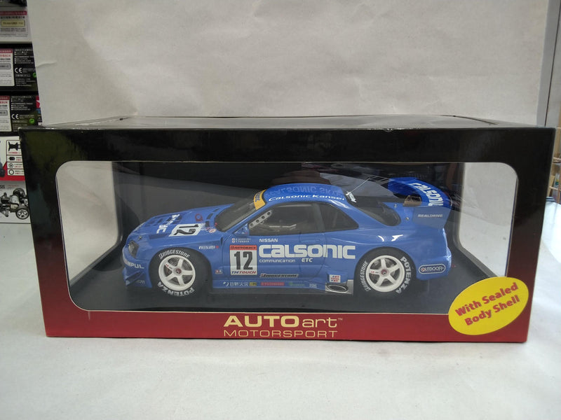 Load image into Gallery viewer, AUTOart JGTC 2002 CALSONIC #12 NISSAN SKYLINE GTR (R34) 1/18 Scale Car– Used
