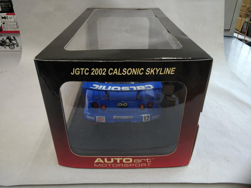 Load image into Gallery viewer, AUTOart JGTC 2002 CALSONIC #12 NISSAN SKYLINE GTR (R34) 1/18 Scale Car– Used
