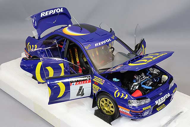 Laden Sie das Bild in Galerie -Viewer, Kyosho 1/18 Subaru Impreza 1994 RAC Rally Winner #4 C. McRae / D. Ringer
