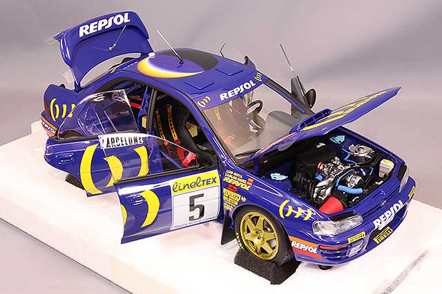 Carica immagine in Galleria Viewer, Kyosho 1/18 Subaru Impreza 1995 Monte Carlo Rally Winner #5 C. Sainz / L. Moya

