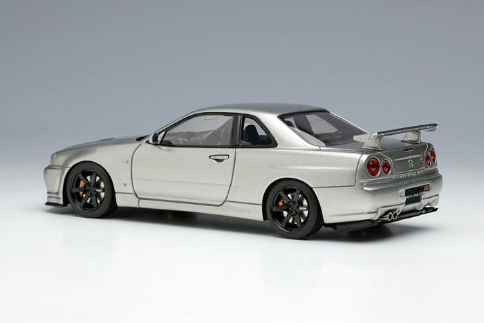 Laden Sie das Bild in Galerie -Viewer, EIDOLON EM510D Nissan Skyline GT-R (BNR34) V-Spec II Nur 2002 (TE37 Wheel) Sparkring Silver Make Up 1/43 EM510D
