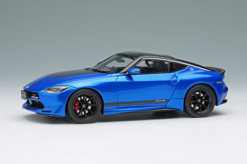 Laden Sie das Bild in Galerie -Viewer, EIDOLON EM735C Nissan Fairlady Z Customized Edition 2024 Seiran Blue Limited 50pcs Make Up 1/43 EM735C
