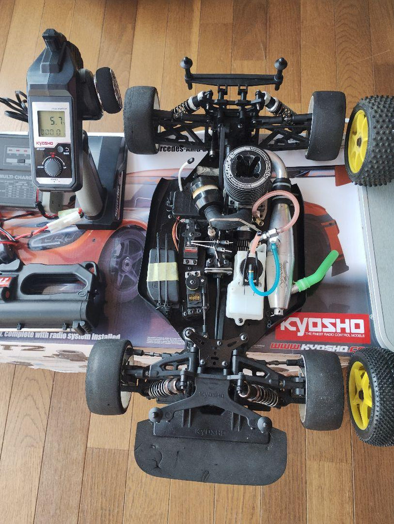 Load image into Gallery viewer, Used Kyosho Inferno GT2 Race Spec and Inferno 4WD RC Car Set with Transmitters
