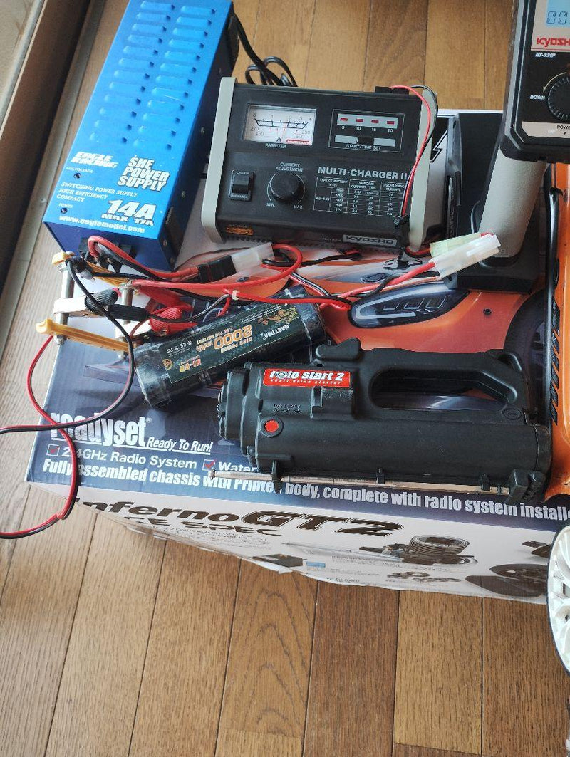 Load image into Gallery viewer, Used Kyosho Inferno GT2 Race Spec and Inferno 4WD RC Car Set with Transmitters
