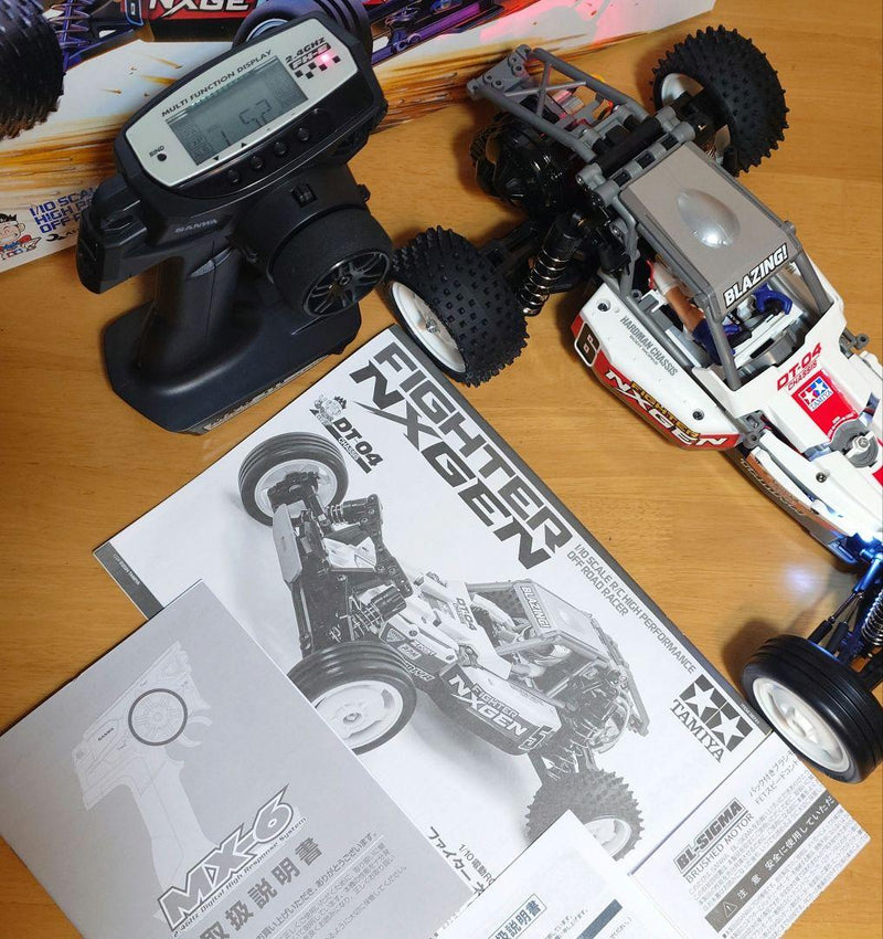 Load image into Gallery viewer, Used Tamiya Fighter NXGEN DT-04 Assembled Full Set with Sanwa MX-6 and LEDs Unused
